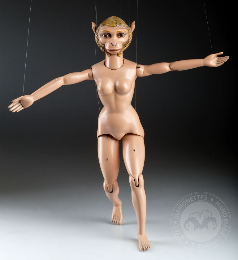Femme singe - marionnette inhabituelle avec un corps de fille et une tête de singe