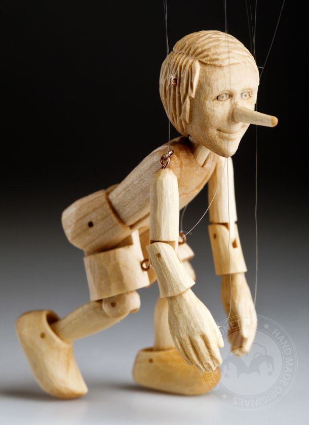 The smallest Pinocchio marionette in the world - a miniature puppet carved from linden wood