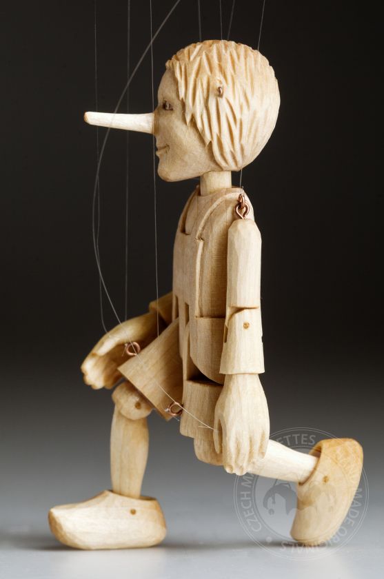 The smallest Pinocchio marionette in the world - a miniature puppet carved from linden wood