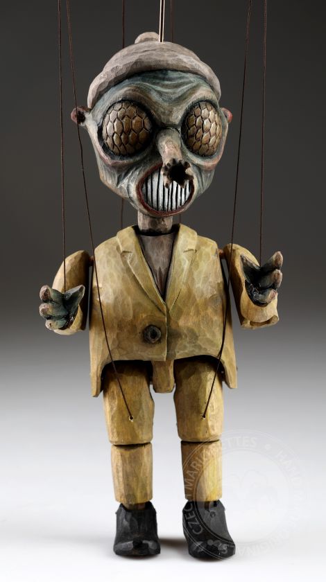 Marionnette de mouche sculptée par Jakub