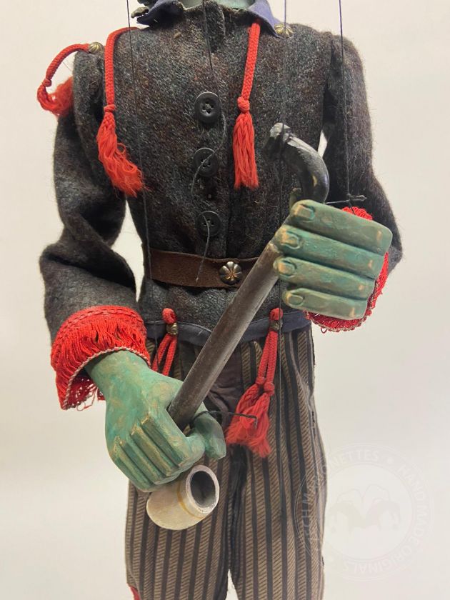 Water spirit with a pipe - antique marionette