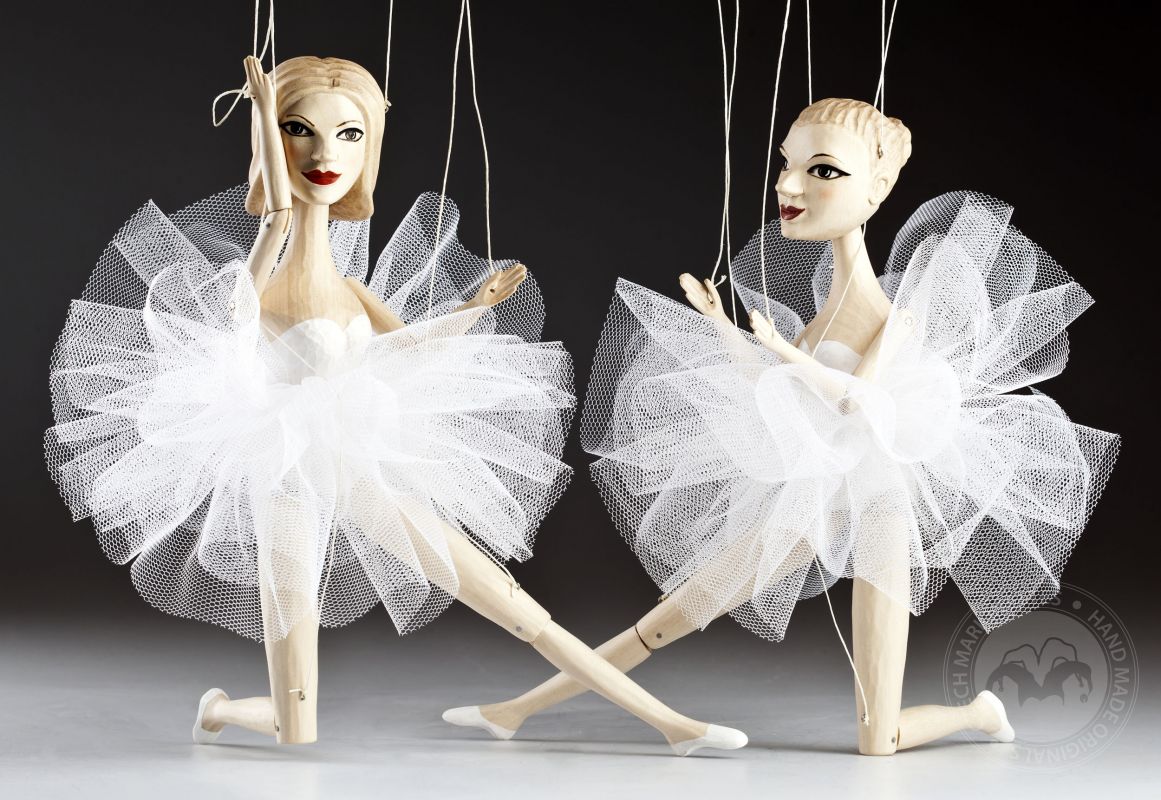 Wooden marionette in ballerina tutu