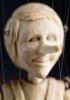 foto: The smallest Pinocchio marionette in the world - a miniature puppet carved from linden wood