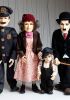 foto: Charlie Chaplin marionettes - a collection of 3 characters from the movie Kid