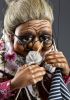 foto: Grandmother with knitting - cute decorative marionette